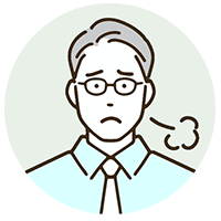 補償の見直しに悩む男性